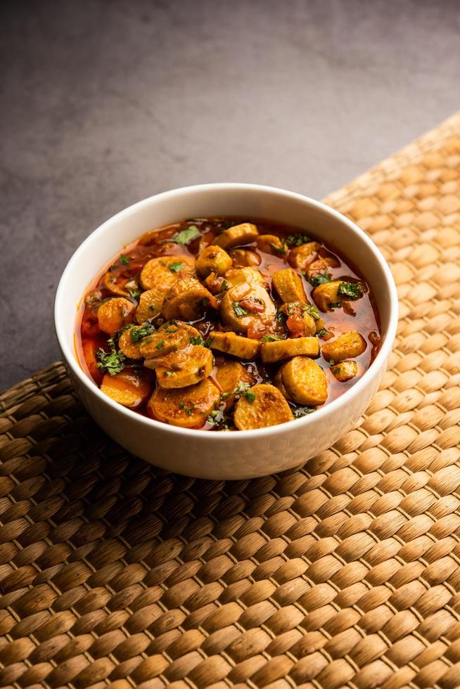 Stir fried taro roots. Arbi ki sabji, ghuiya masala curry Sabzi or arvi dum Masala. Garnished with coriander photo