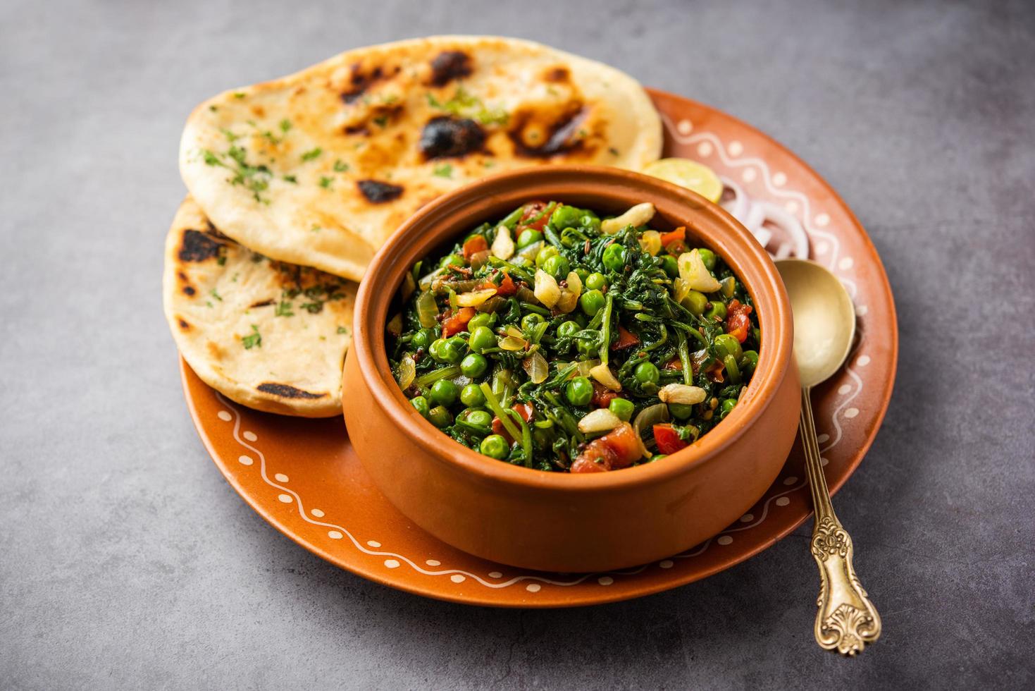 palak matar curry also known as spinach geen peas masala sabzi or sabji, indian food photo