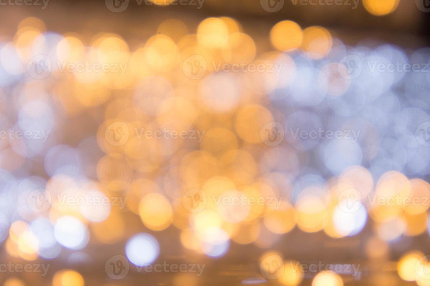 bokeh luz abstracta en el festival día de navidad o feliz año nuevo fondo foto