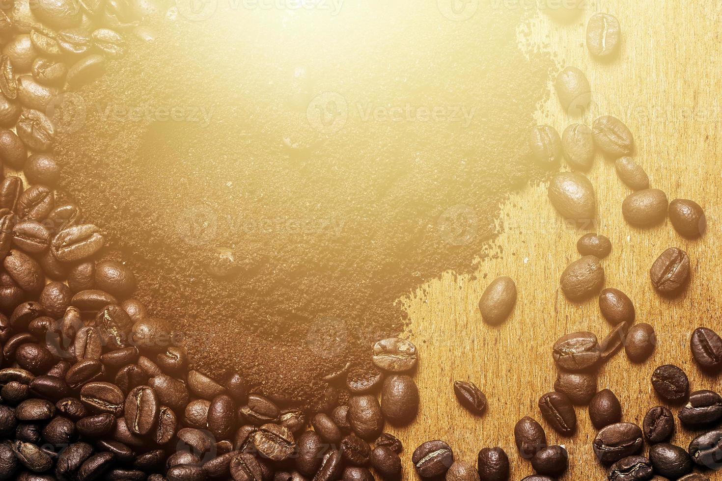 Close-up of coffee beans and ground coffee photo