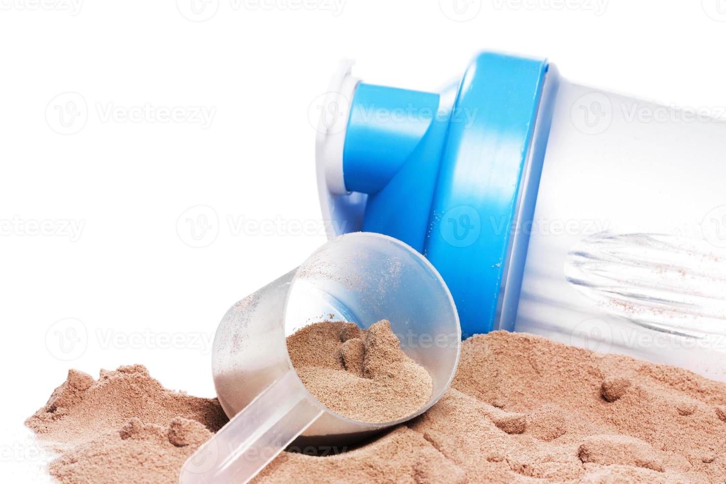 Shaker, scoop and chocolate whey protein or mass gainer powder photo