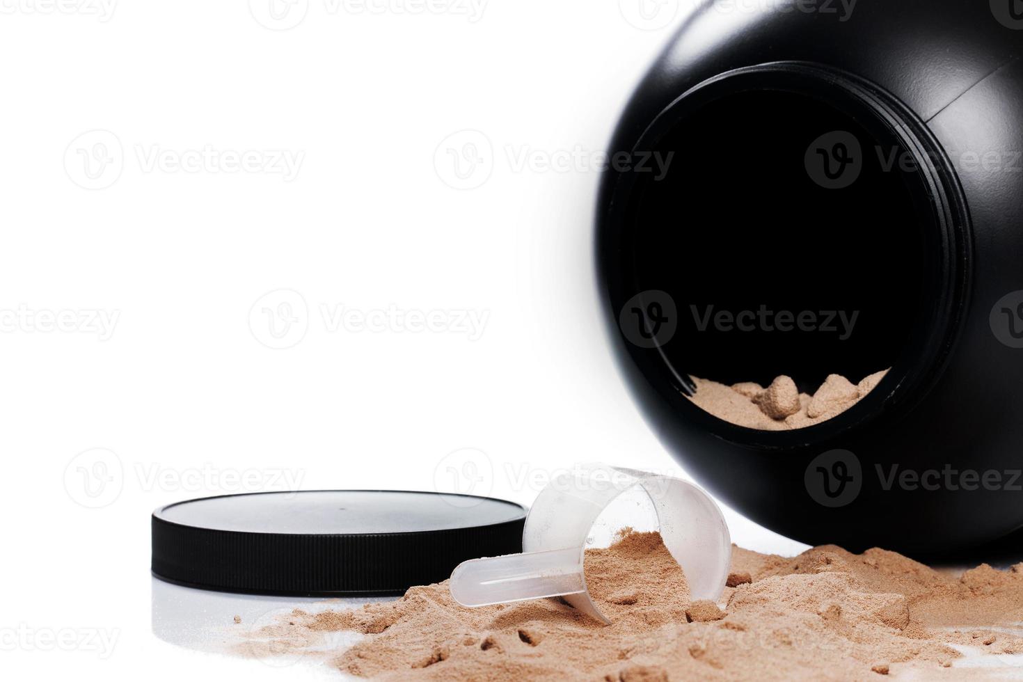 Big jar of whey protein powder on white background photo
