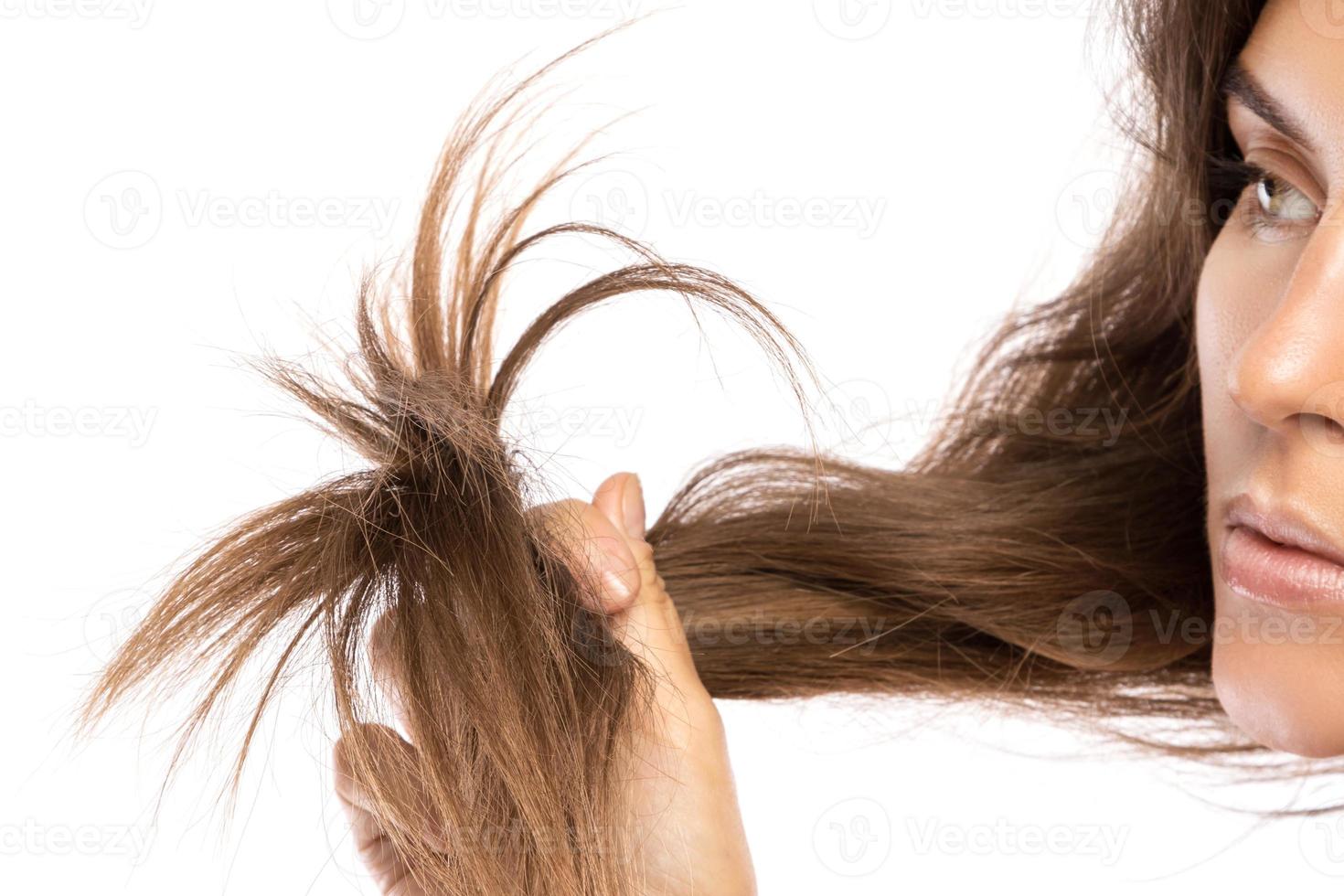 Health codition of female hair on white background photo