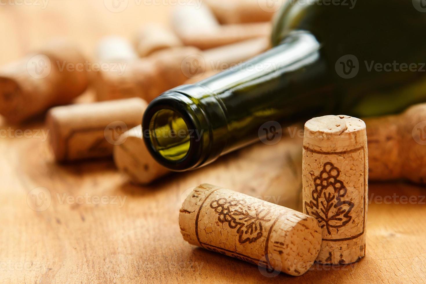 Wine corks and bottle photo