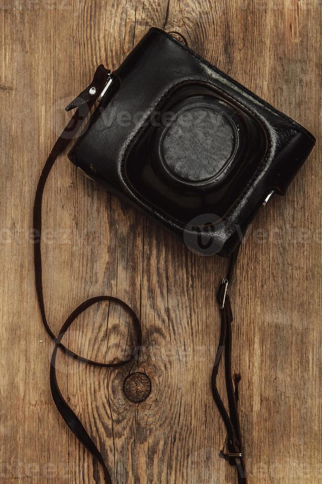 Retro camera in leather case photo