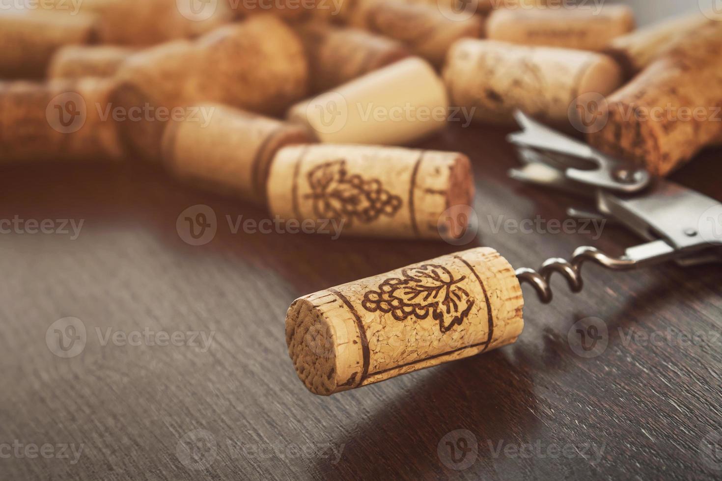 Corkscrew and corks photo