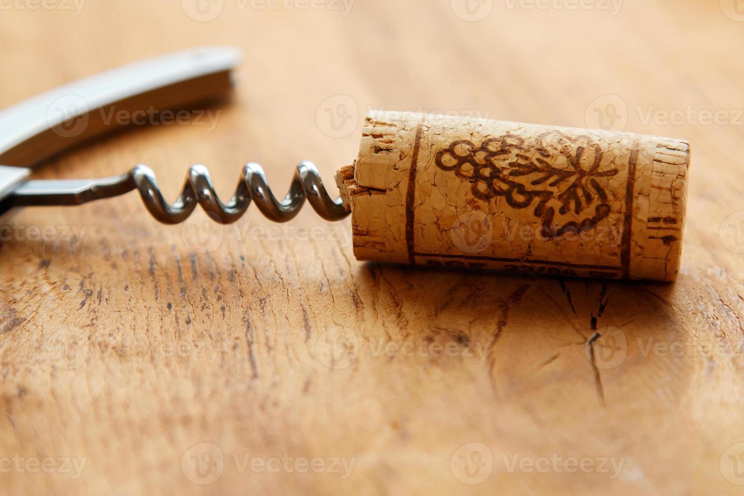 Corkscrew and corks photo