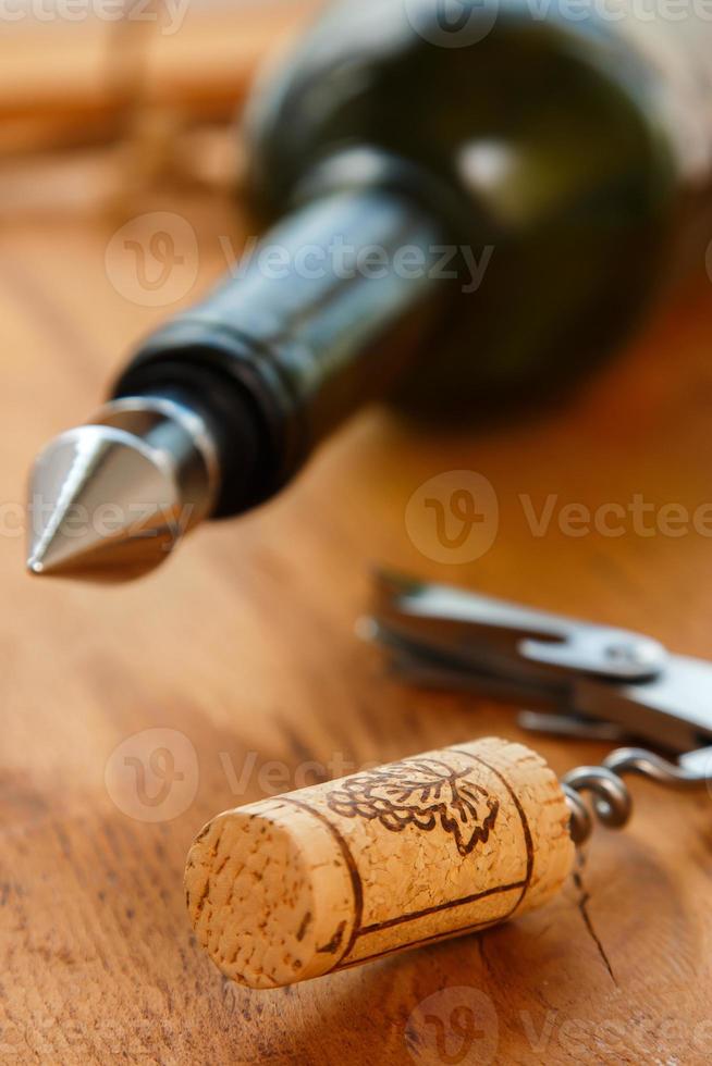 Corkscrew and corks photo