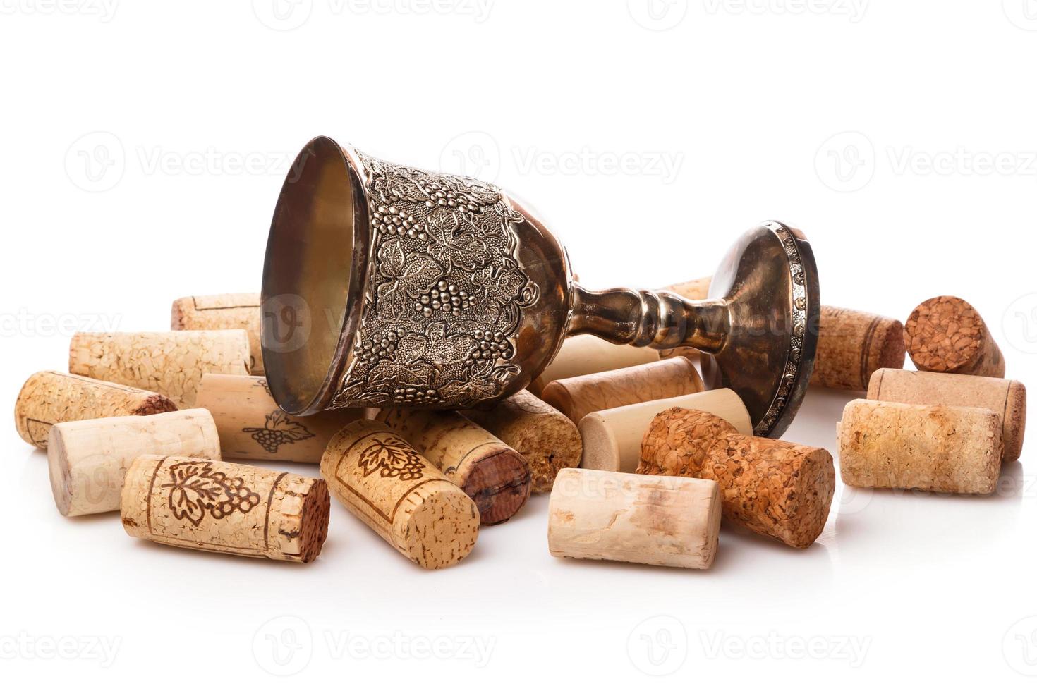 Old goblet and wine corks photo
