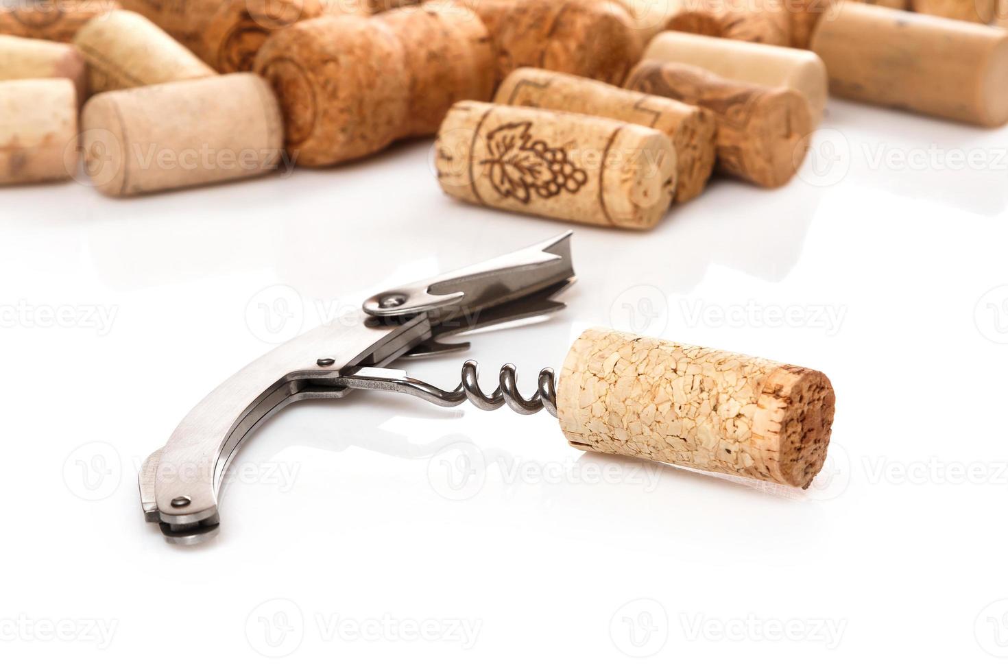 Corkscrew and corks photo