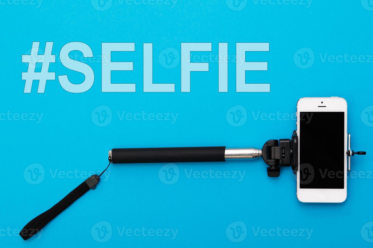 Selfie stick and smart phone photo