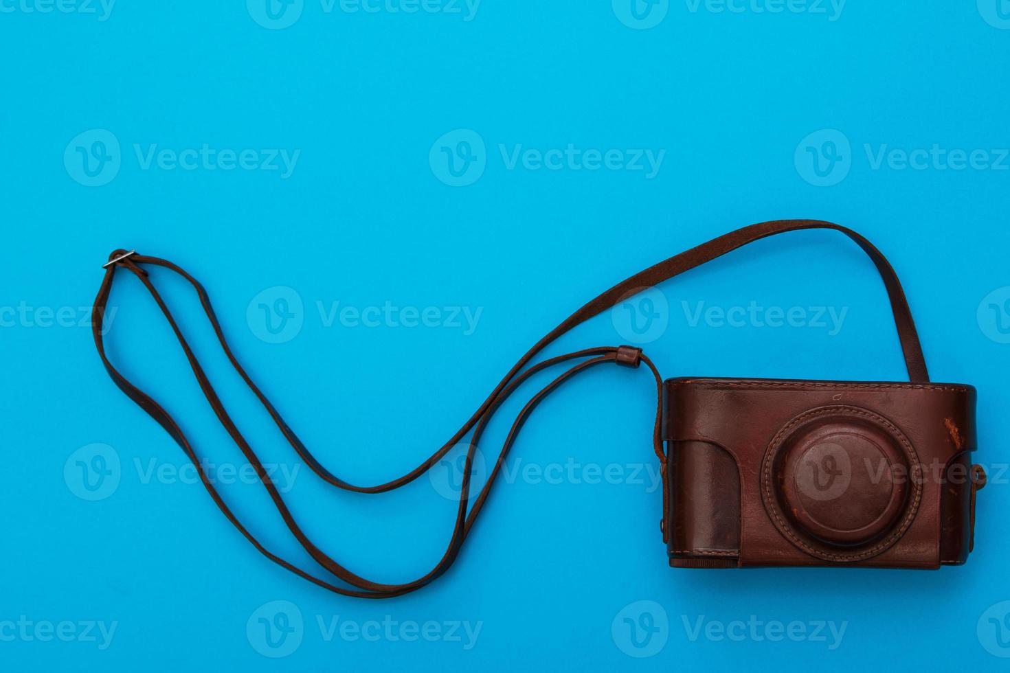 Retro camera in leather case 16290041 Stock Photo at Vecteezy
