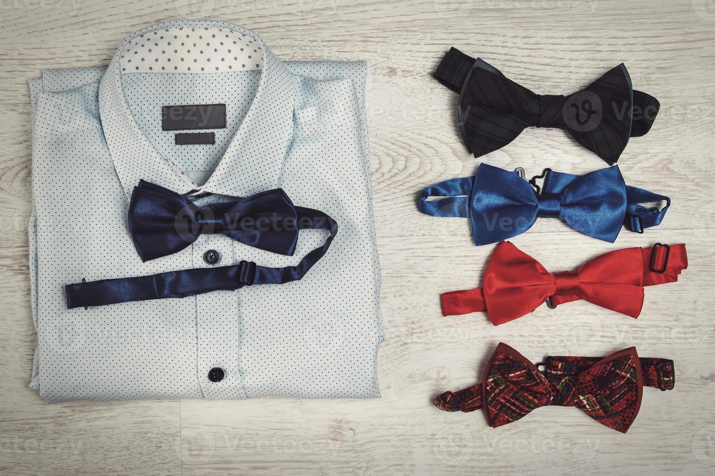 Shirt and different bow ties photo