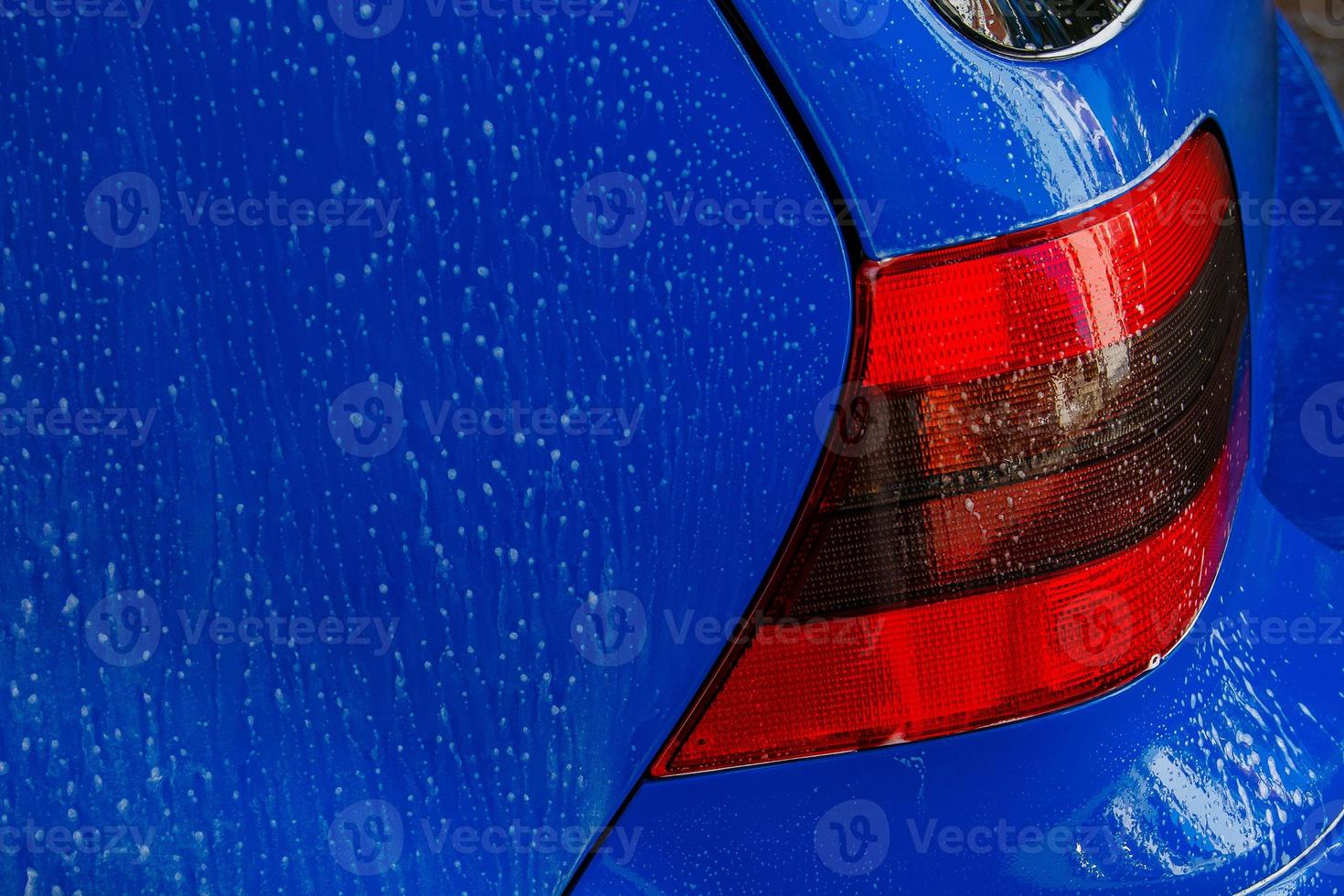Blue car in a car wash photo