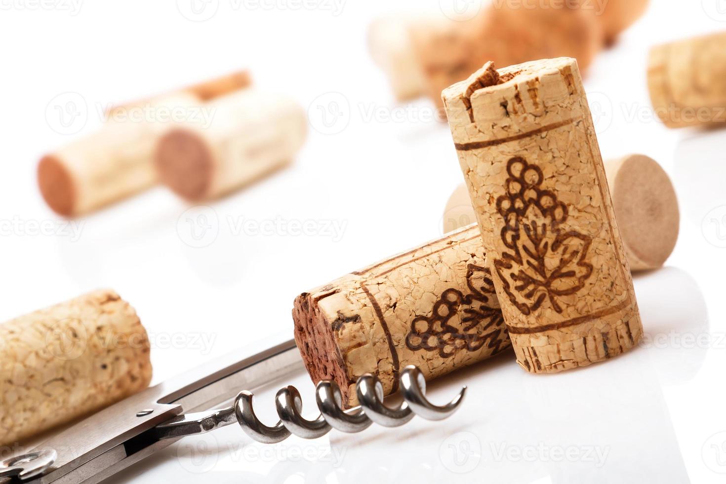 Corkscrew and corks photo