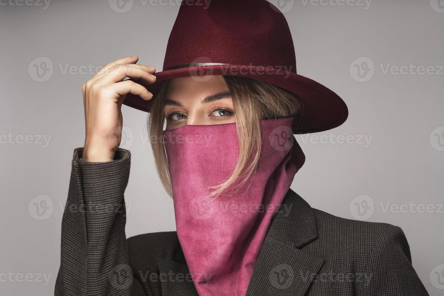 New normal fashion. Woman wearing leather bandana instead of prevention mask. photo