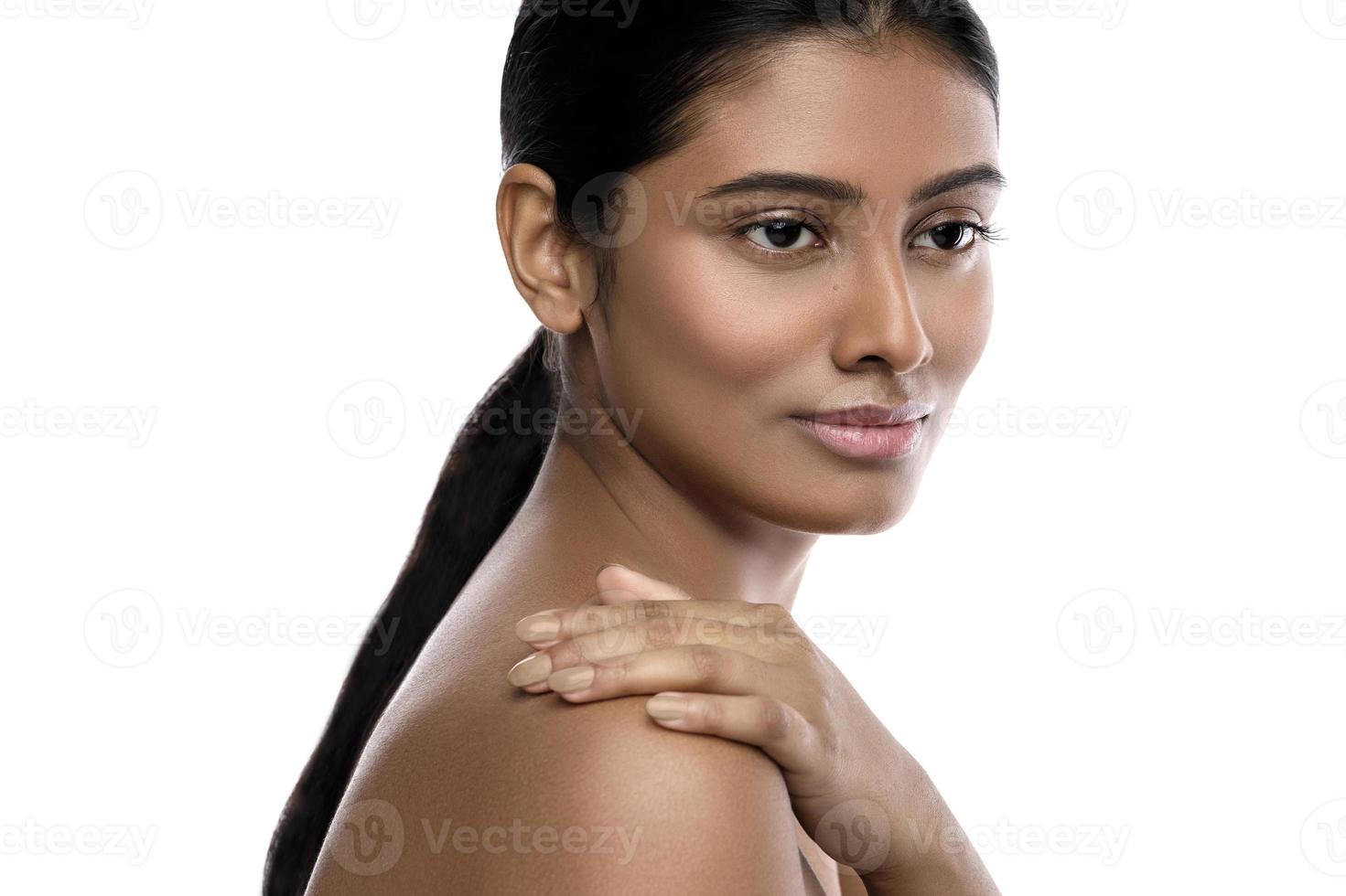 Young and beautiful Indian woman with a smooth skin photo