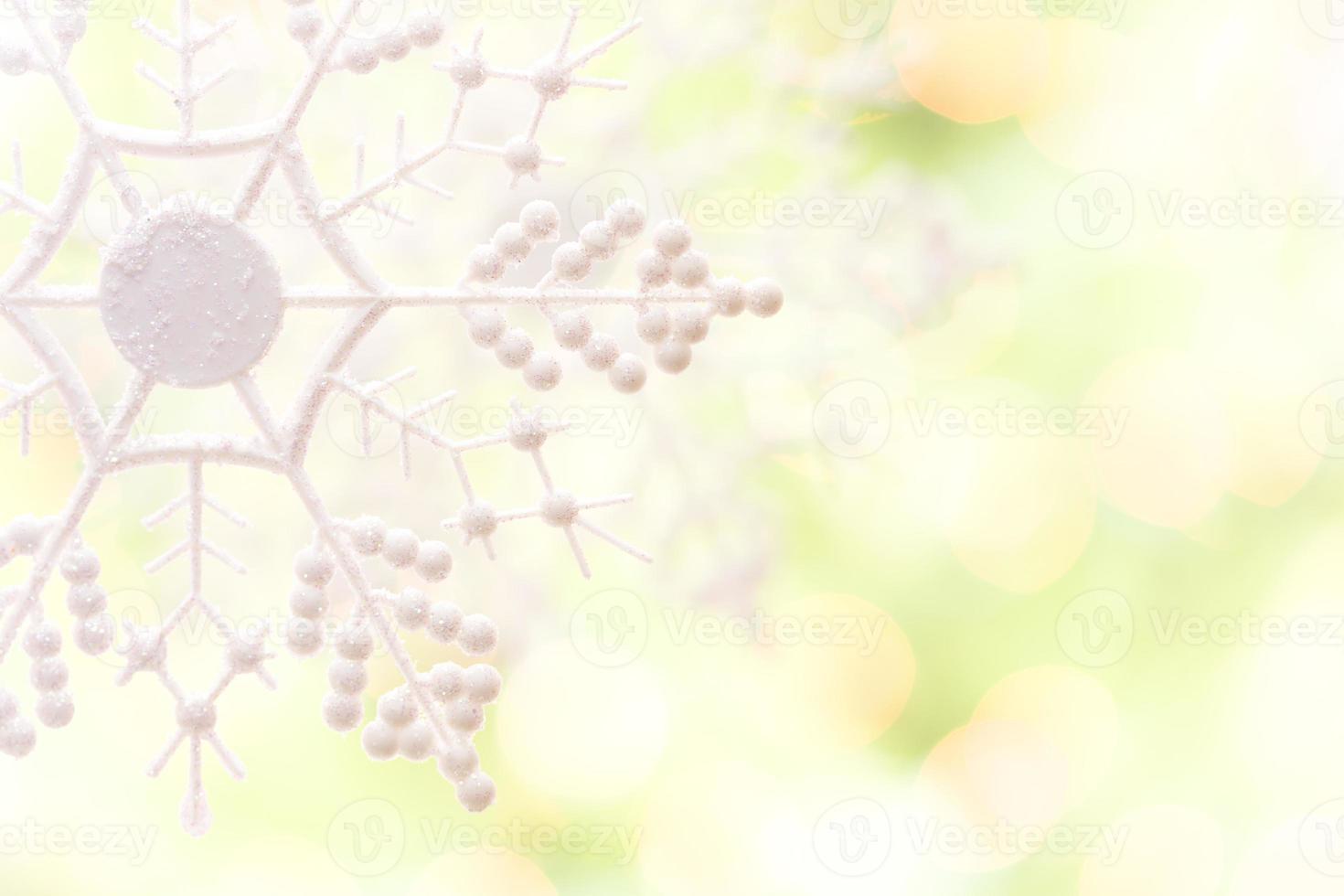 Snowflake Over an Abstract Green and Gold Background photo