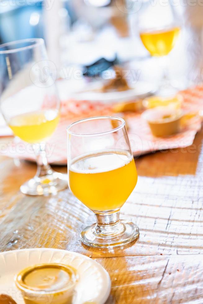 Abstract of Small Glass of Micro Brew Beers On Bar photo