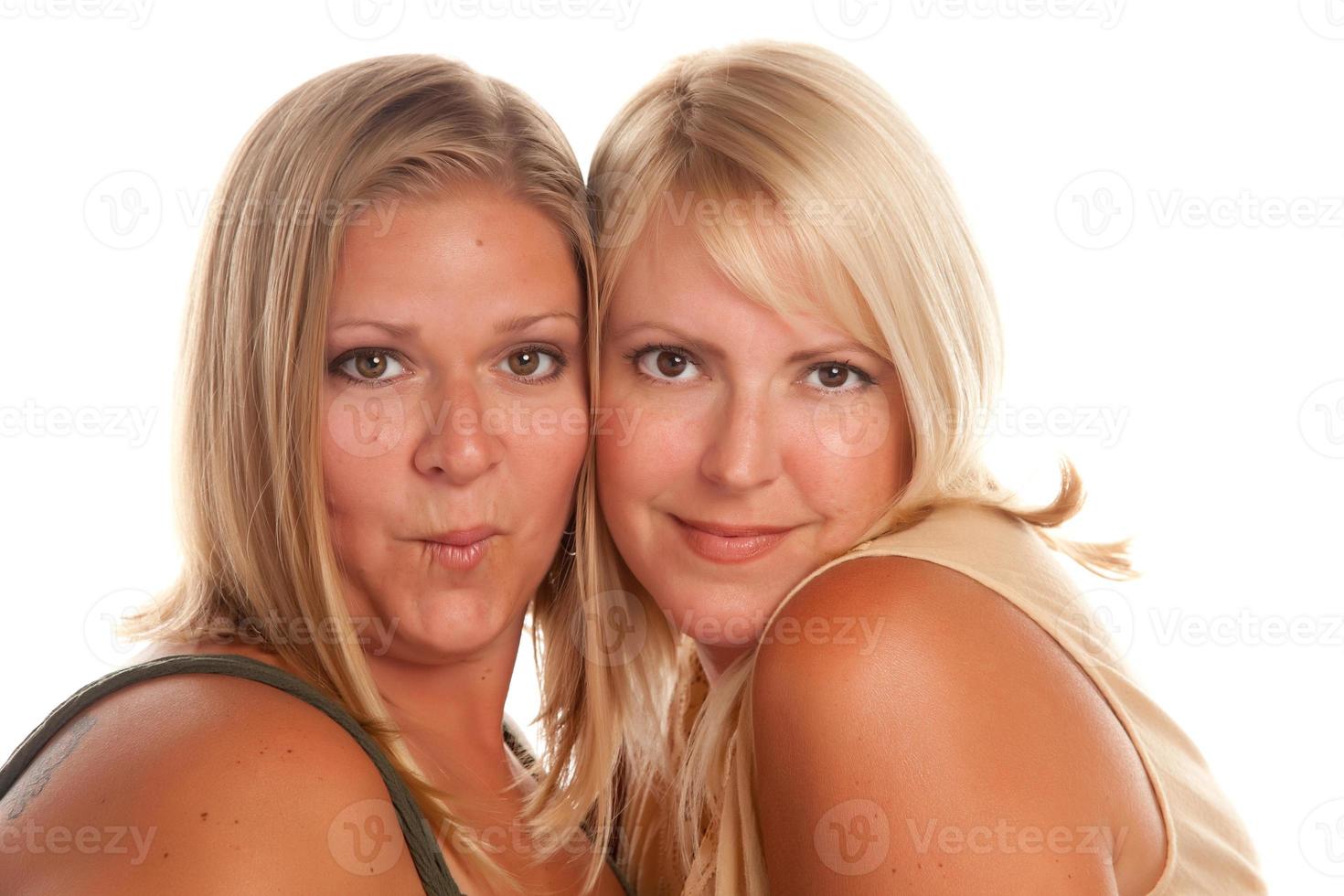 Blonde girlfriends next to each other photo