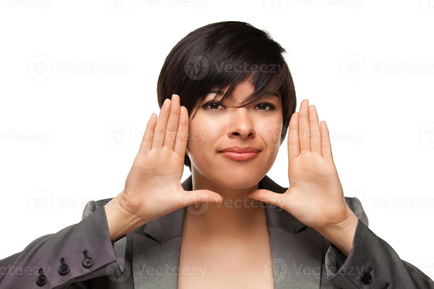 Pretty Smiling Multiethnic Young Adult Woman Framing Face with Hands photo