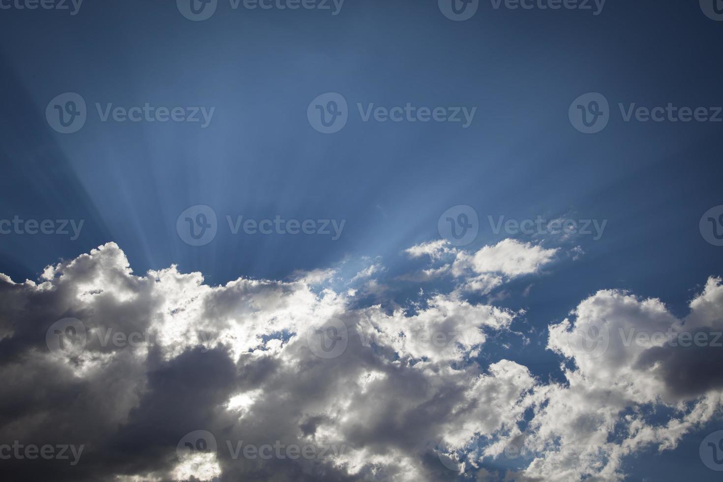 Silver Lined Storm Clouds with Light Rays and Copy Space photo