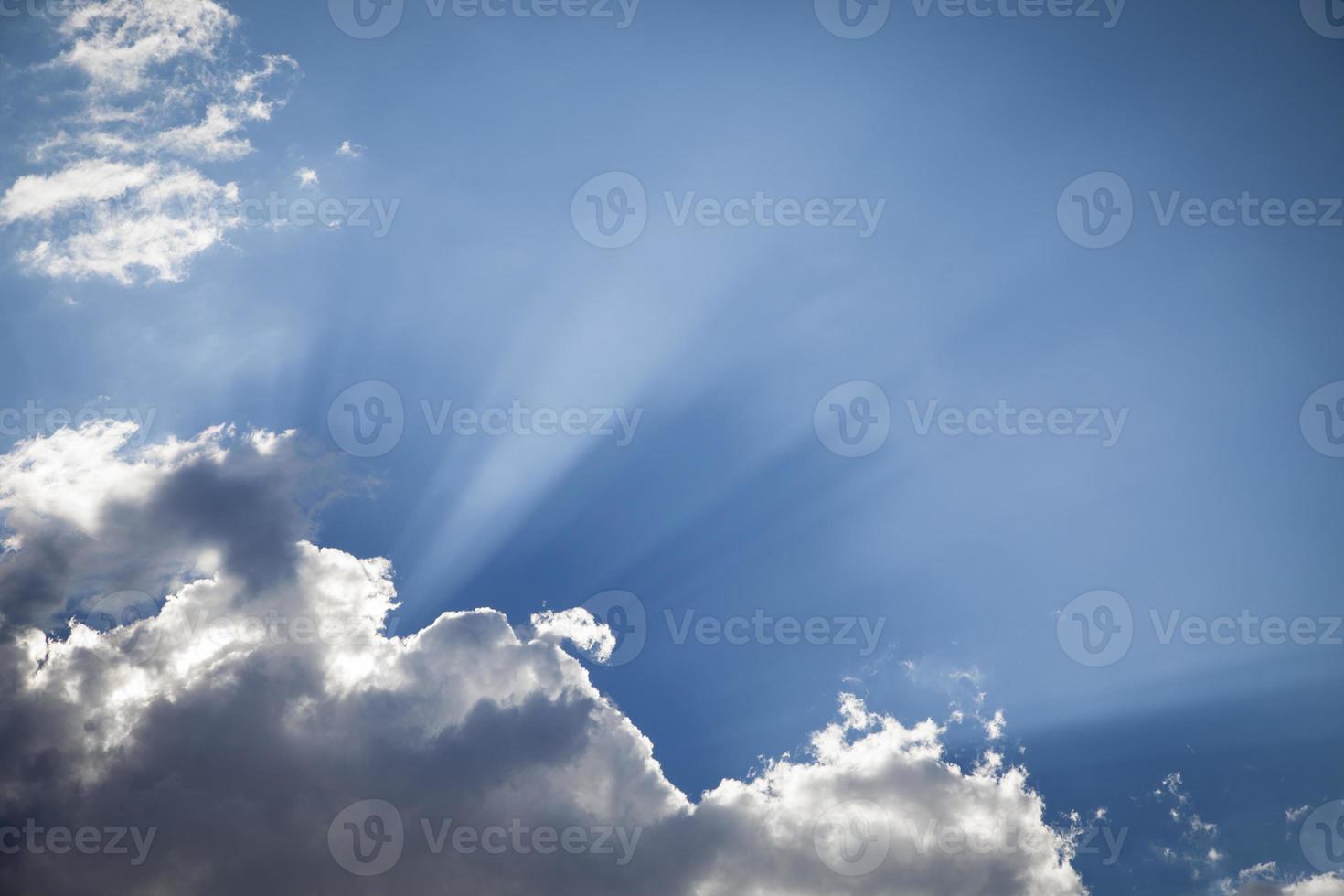 Silver Lined Storm Clouds with Light Rays and Copy Space photo