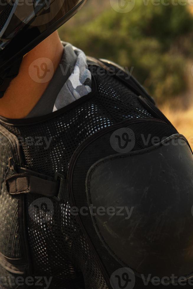 Closeup of professional MTB rider body armour for downhill photo