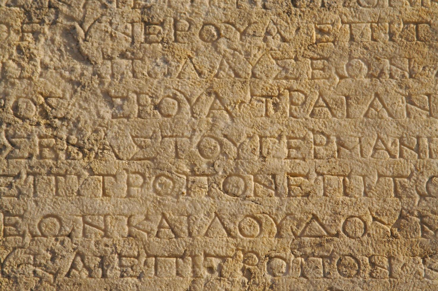 A close up of ancient Greek text. photo