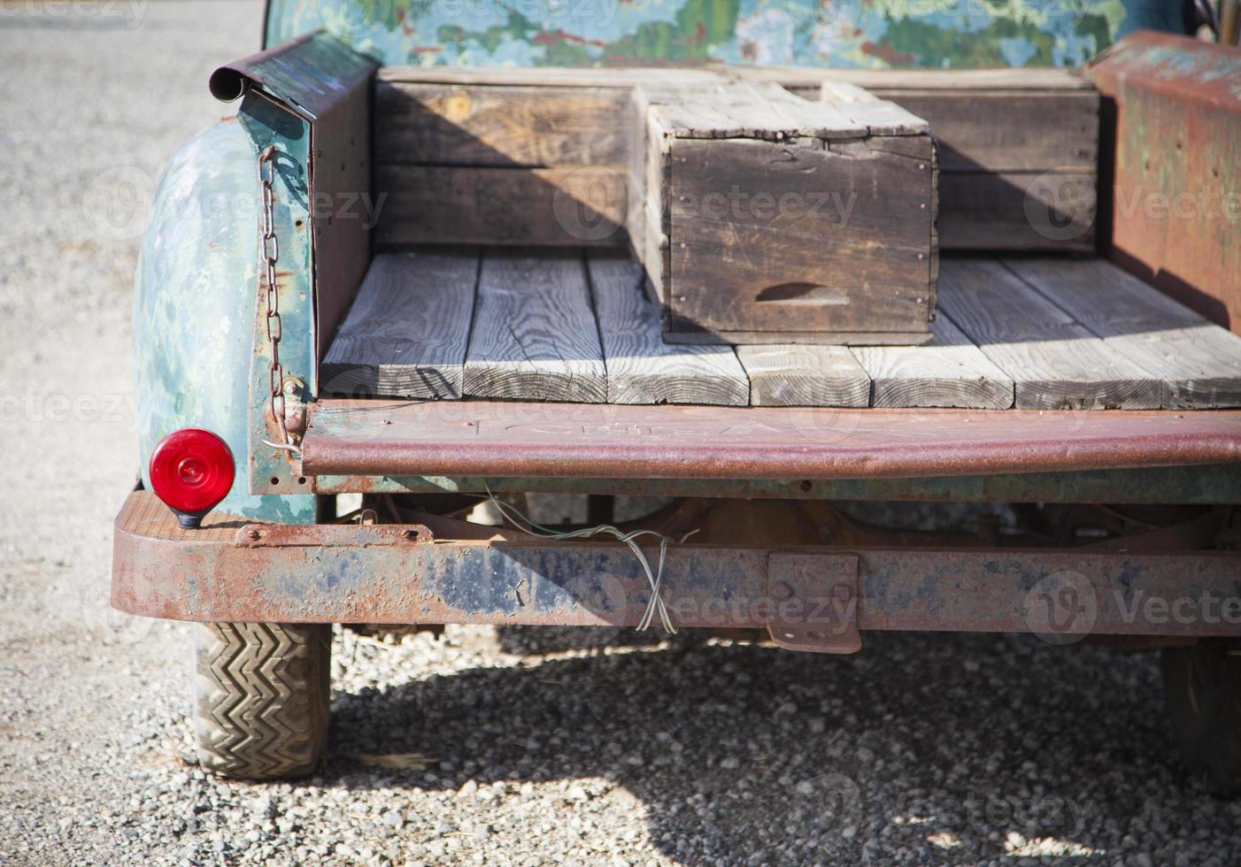 Old Rusty Antique Truck Abstract in a Rustic Outdoor Setting photo