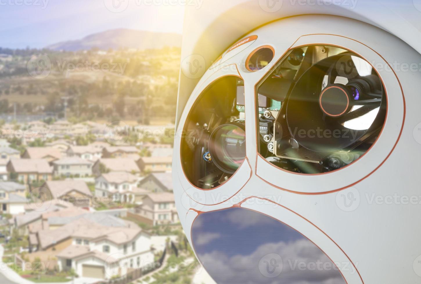 Closeup of Drone Camera and Sensor Pod Module Above Neighborhood photo