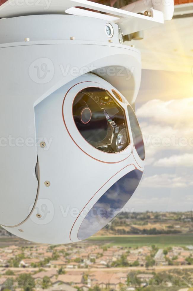 Closeup of Drone Camera and Sensor Pod Module Above Neighborhood photo