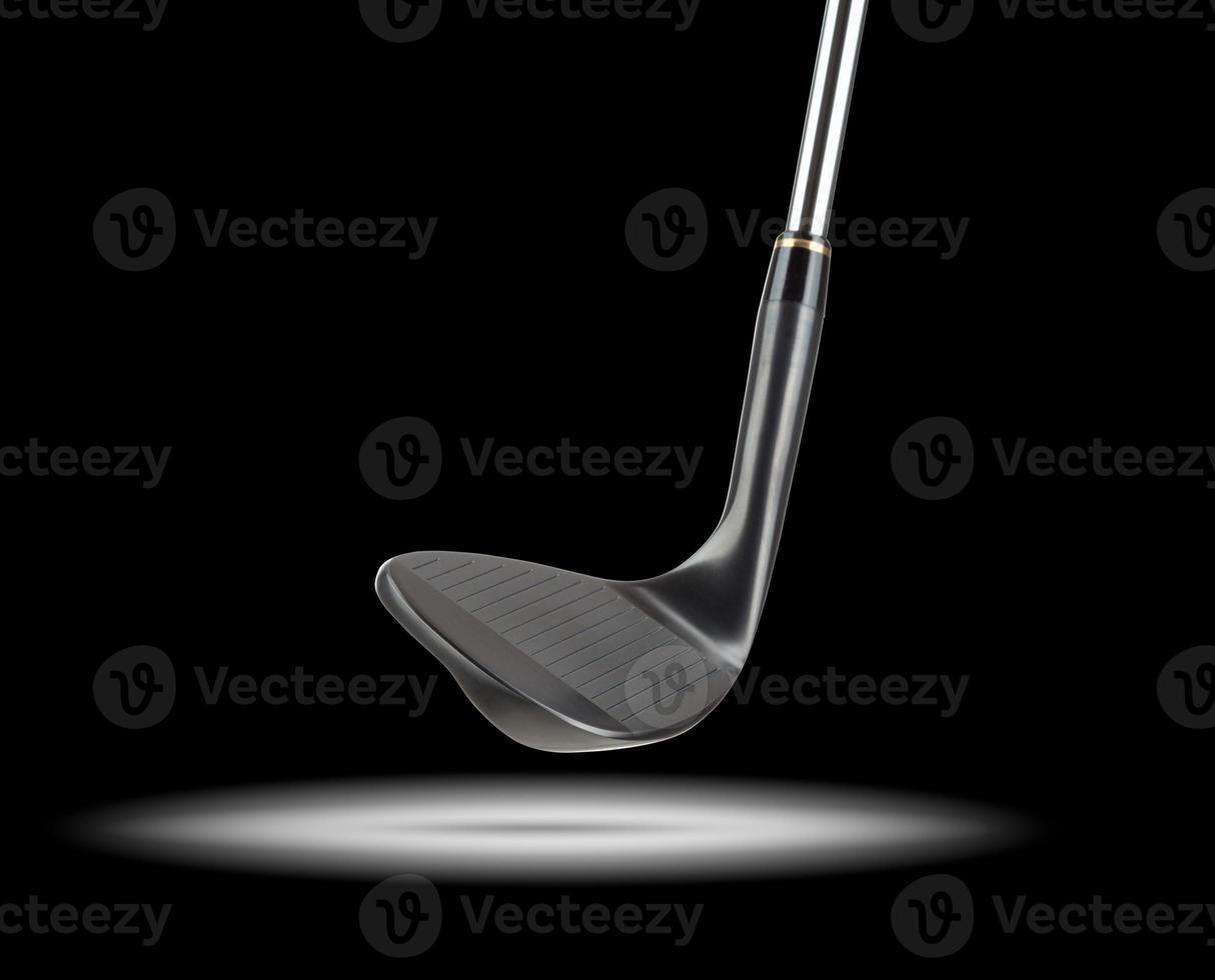 Black Golf Club Wedge Iron Under Spot Light With Black Background photo