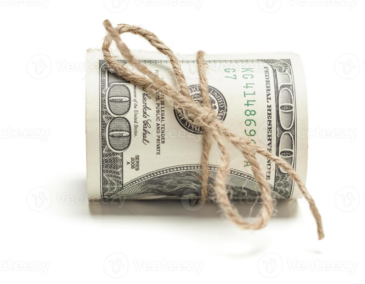 Roll of One Hundred Dollar Bills Tied in Burlap String on White photo