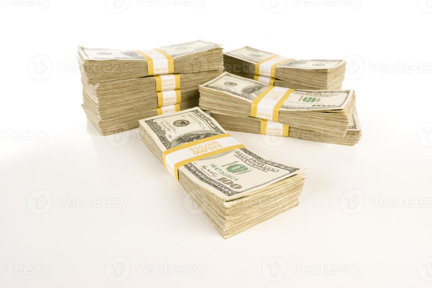 Stacks of One Hundred Dollar Bills on Gradation photo