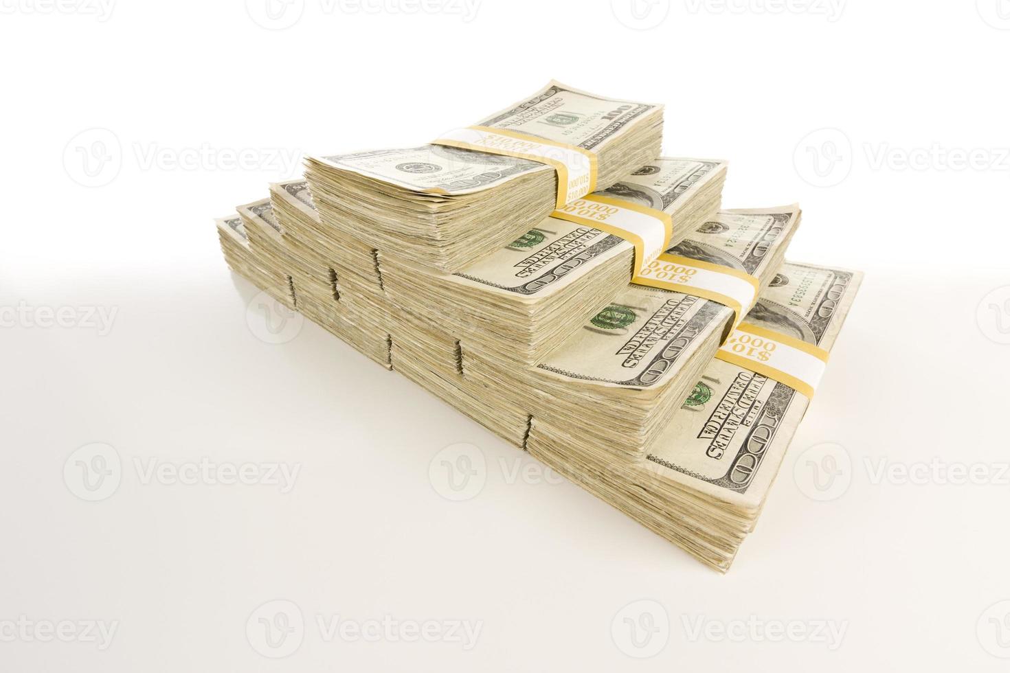 Stacks of One Hundred Dollar Bills on Gradation photo