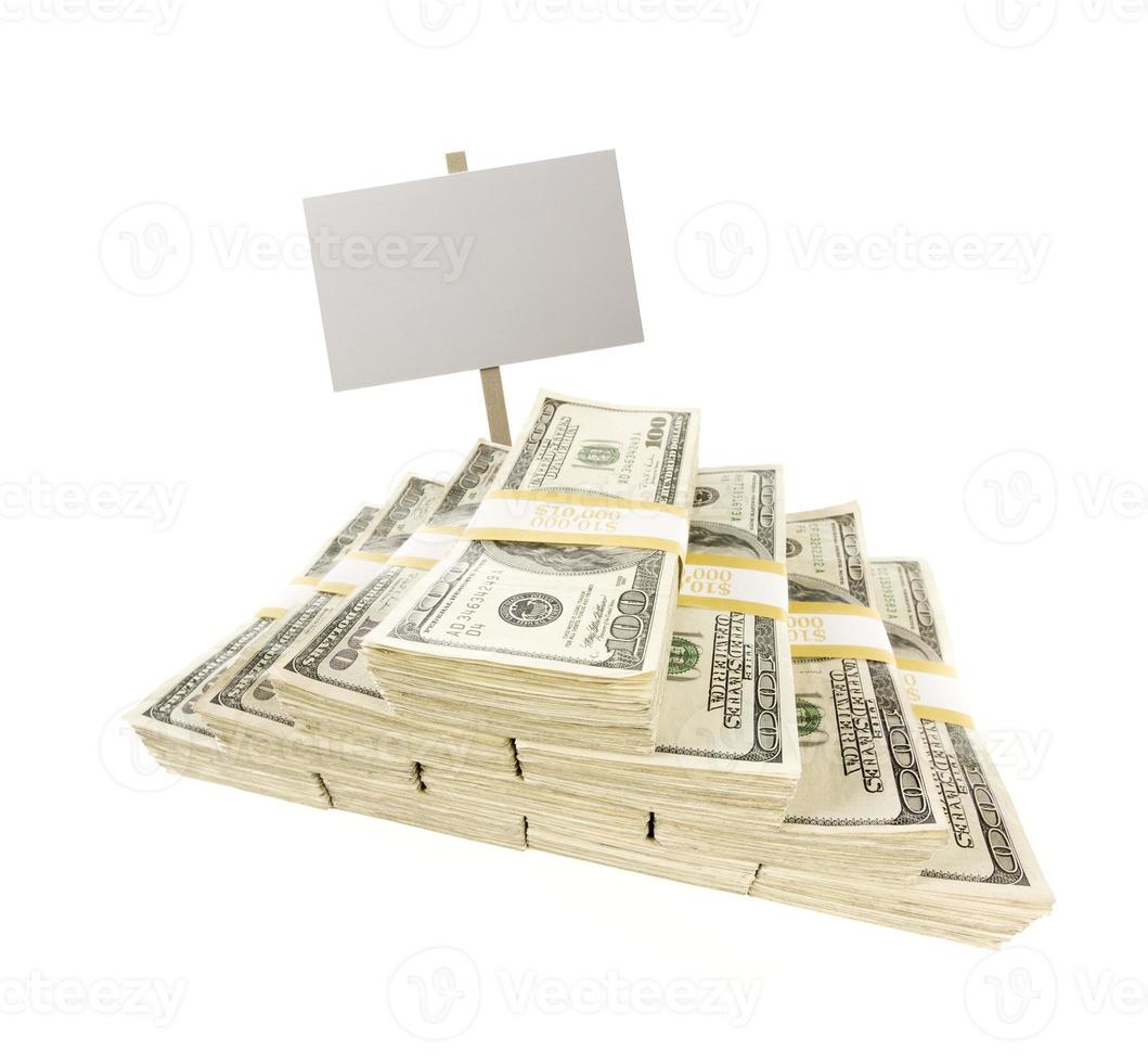 Stacks of One Hundred Dollar Bills on White with Blank Sign photo