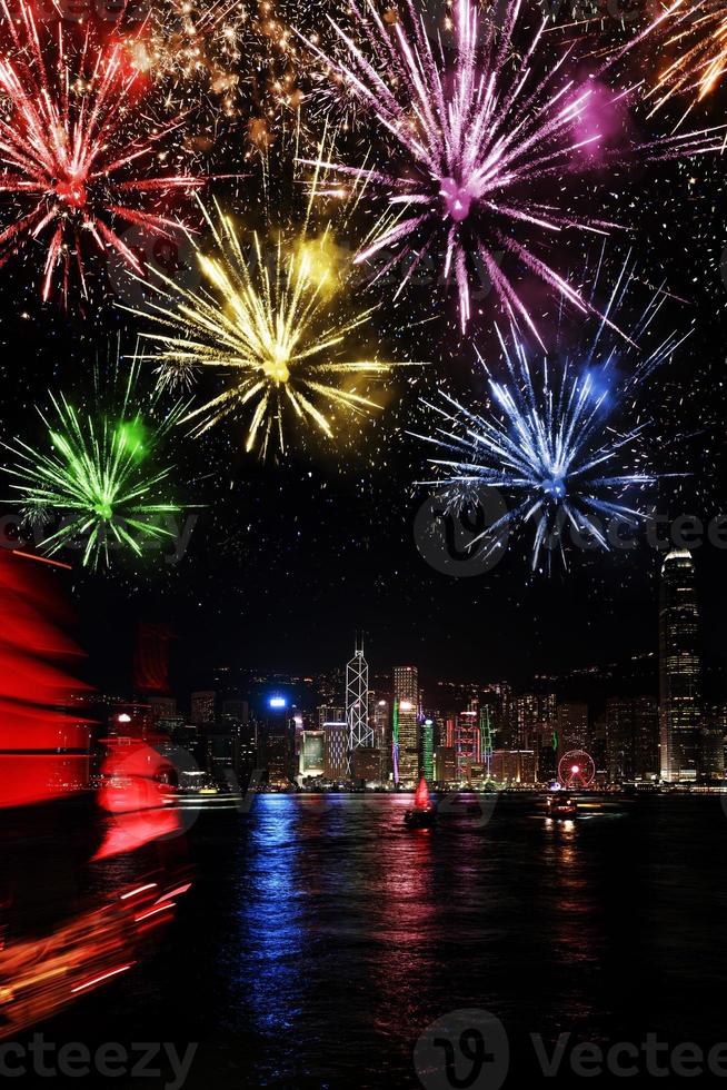 Night Hong Kong with colorful fireworks view from the Victoria Harbour photo