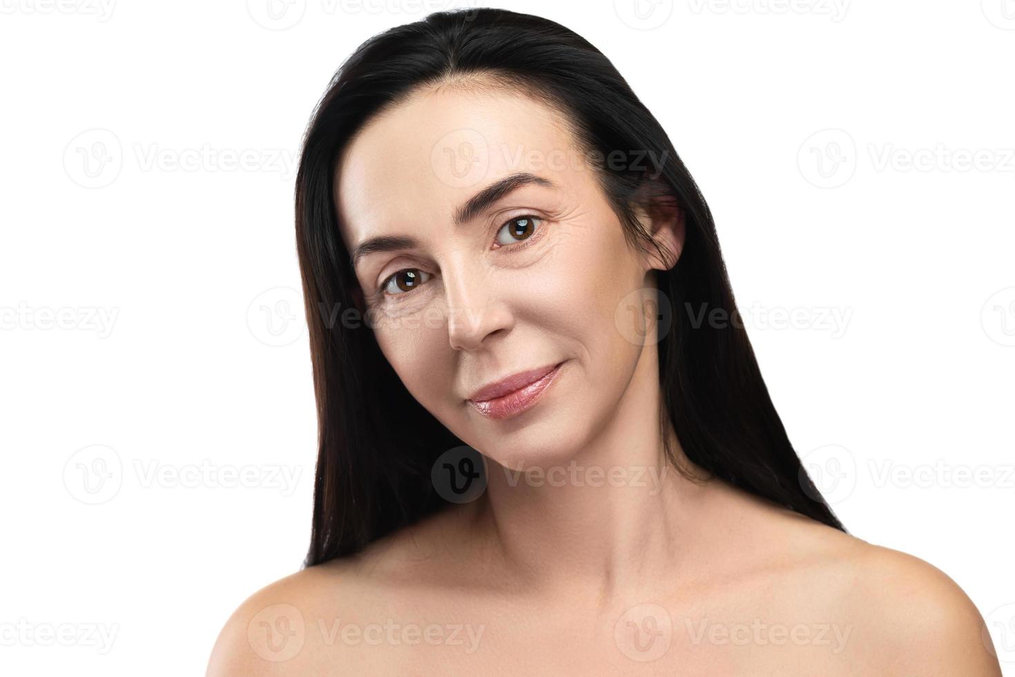 Beautiful middle aged woman on white background photo