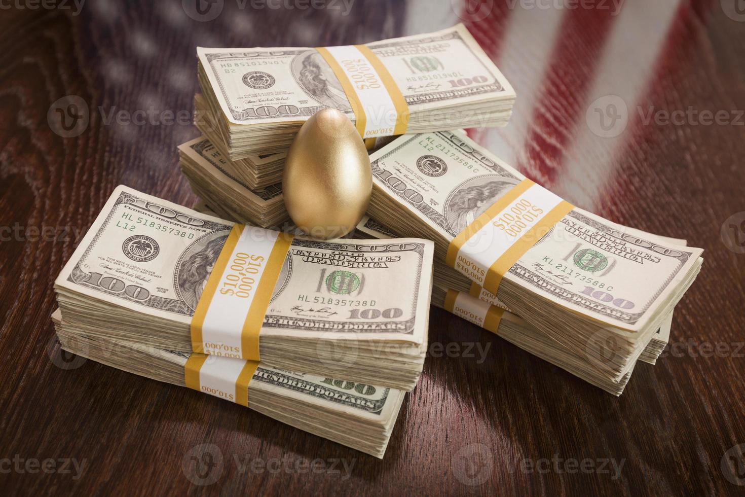 Golden Egg and Thousands of Dollars with American Flag Reflection photo