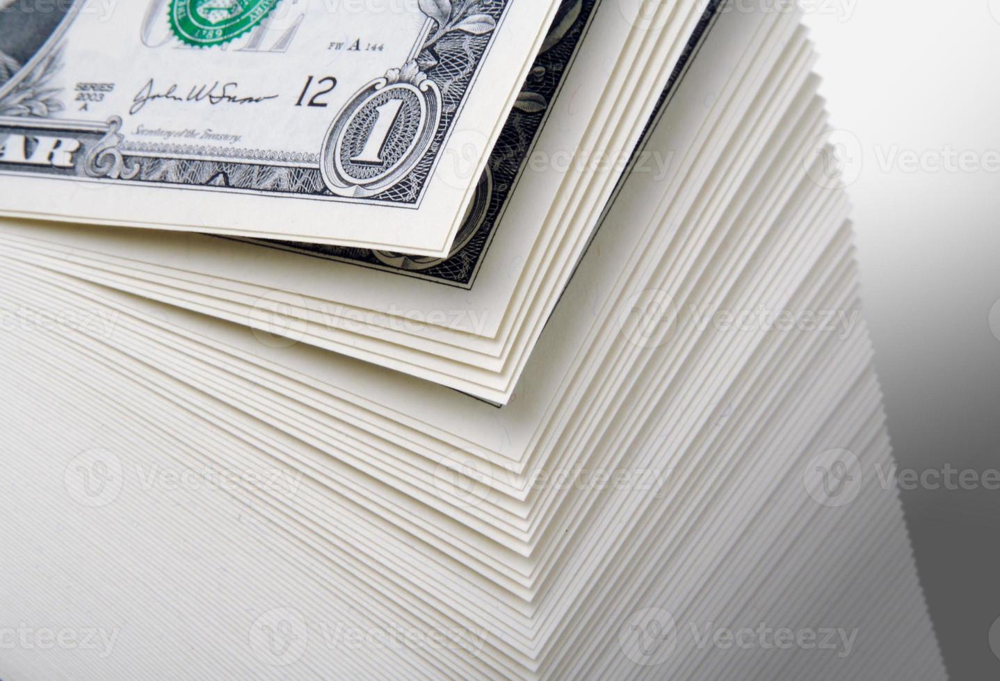 Abstract of a Large Stack of One Dollar Bills photo