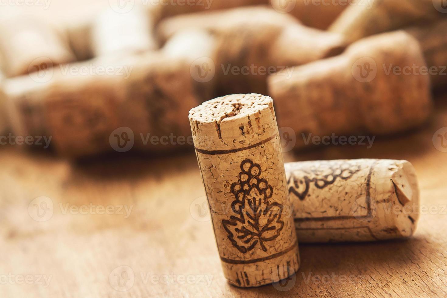 Wine corks on wooden table photo