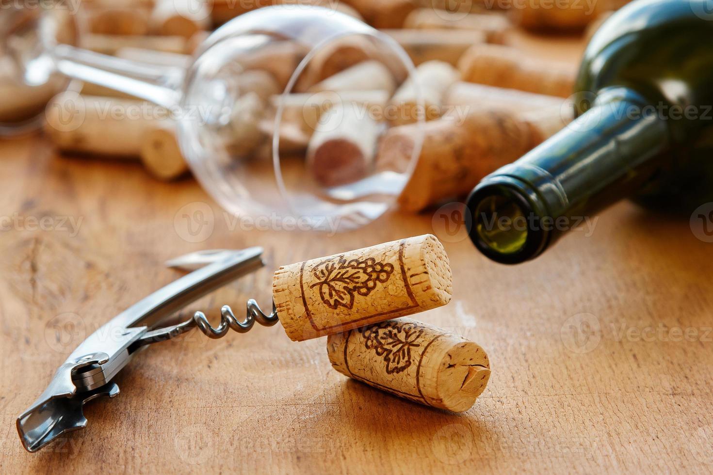 Corkscrew and corks photo