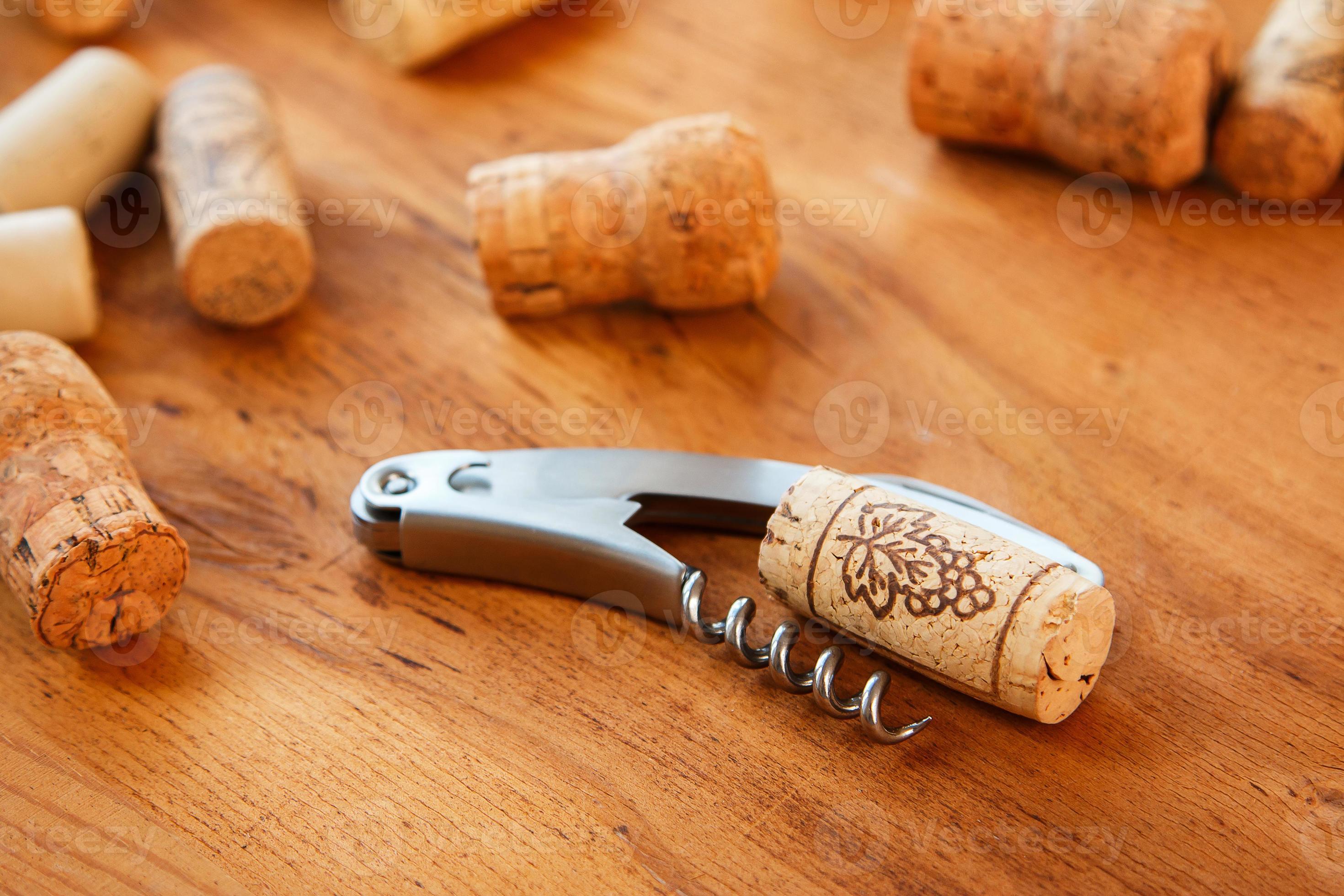 Corkscrew and corks 16295421 Stock Photo at Vecteezy