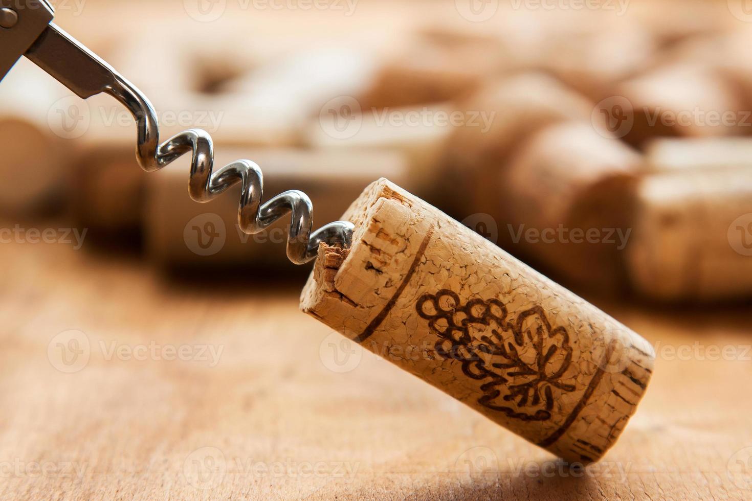 Corkscrew and corks photo