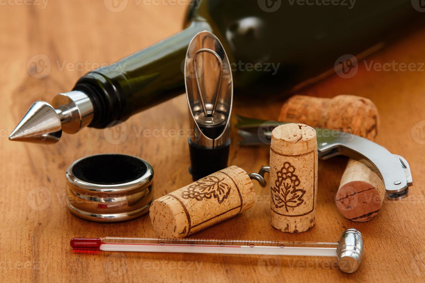 Different wine tools and corks photo