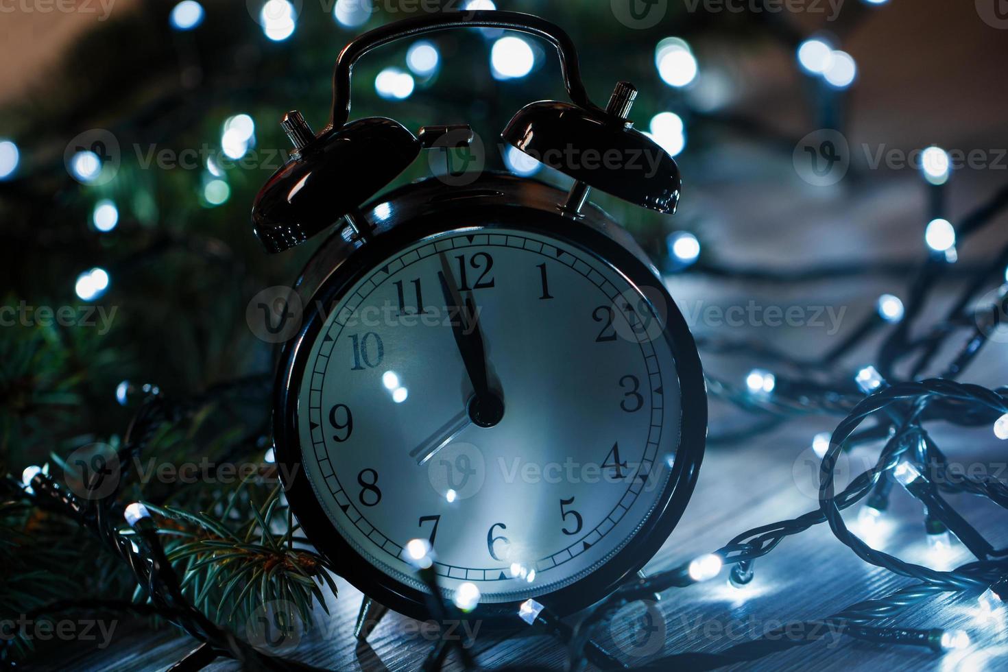 Alarm clock and christmas lights photo