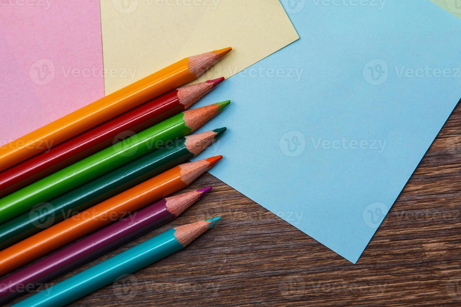 Colorful pencils and memo stickers photo