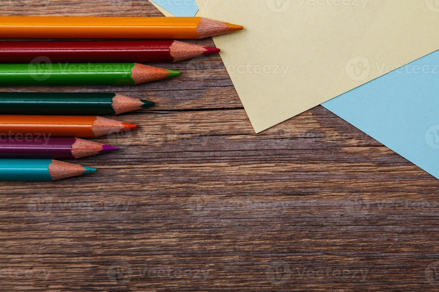 Colorful pencils and memo stickers photo