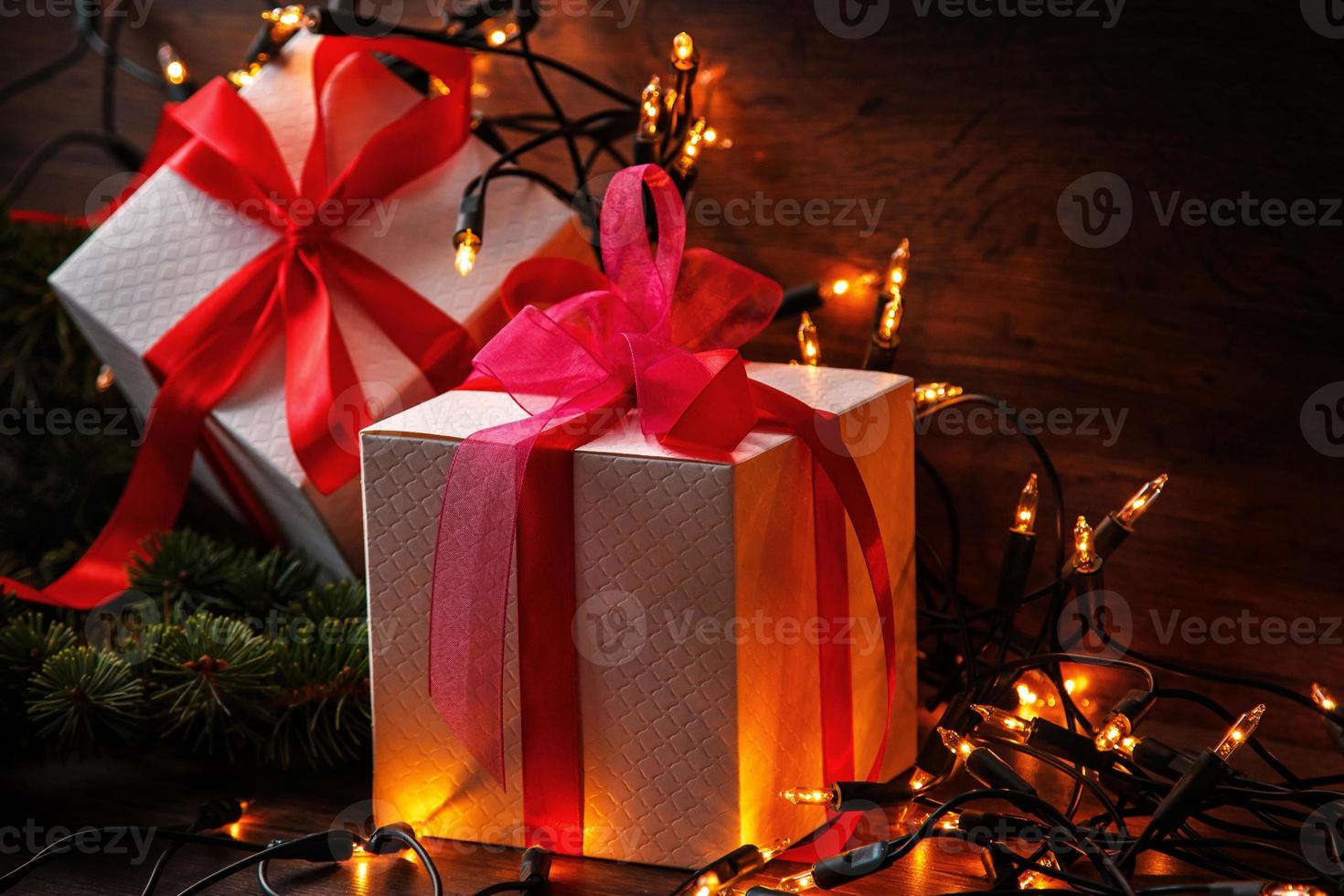 Christmas background with gift boxes and lights photo